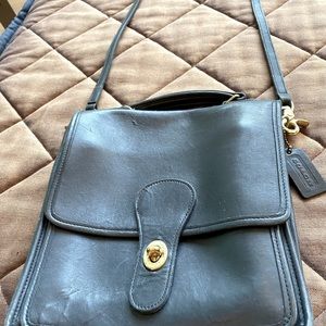 Vintage black leather coach crossbody bag.